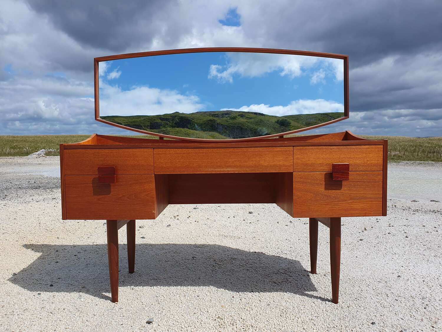 I.B Kofod Larsen For G Plan. A Danish Line Bow Fronted, Teak Dressing Table. 1960s